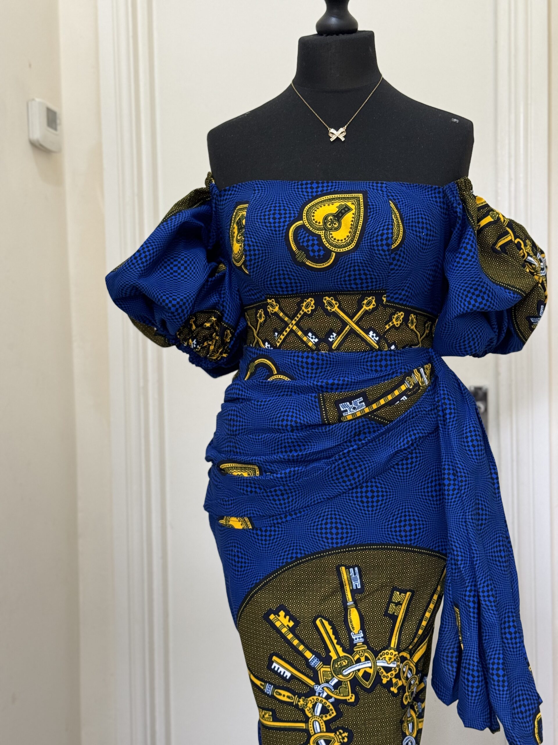 OFF-THE-SHOULDER ROYAL BLUE KEY PRINT GOWN