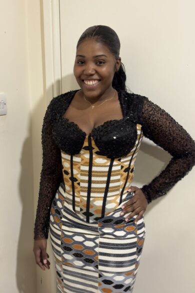 BLACK SEQUIN AND PATTERNED CORSET GOWN